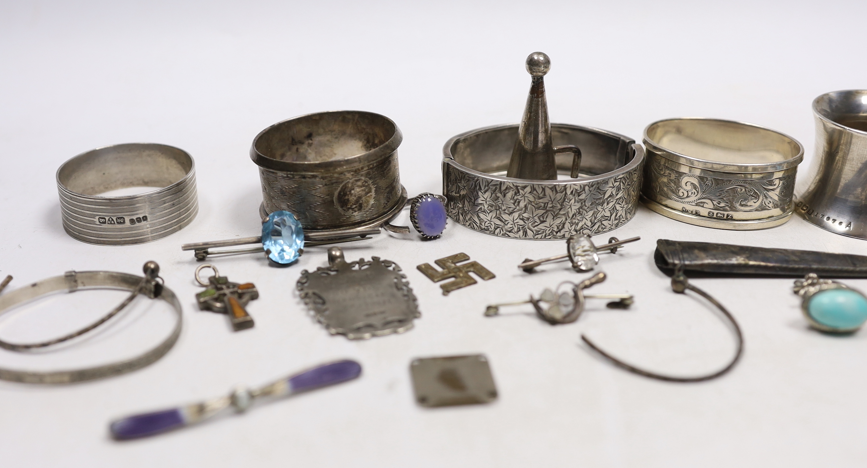 Small silver and other items including napkin rings, bracelets, 19th century vinaigrette, medals, etc.